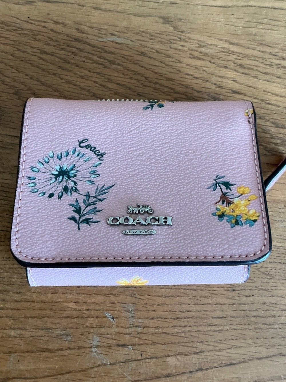 Coach small pink trifold wallet in dandelion floral print, preowned, ex cond